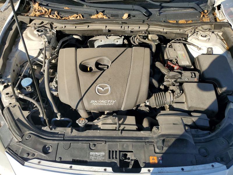 Photo 11 from auction – 2015 MAZDA 3 with VIN 3MZBM1L79FM209185