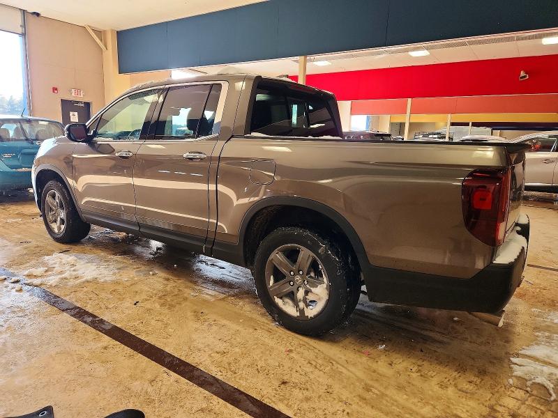 Photo 2 from auction – 2021 HONDA RIDGELINE with VIN 5FPYK3F71MB002440