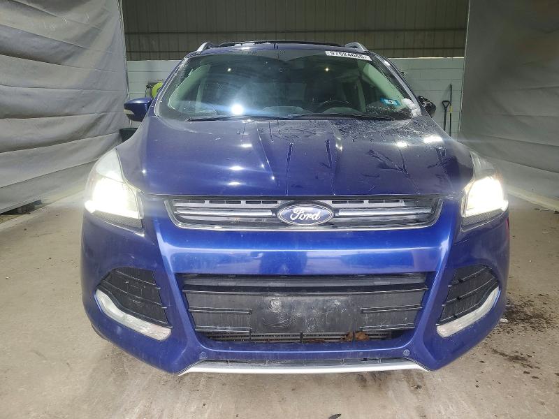 Photo 5 from auction – 2015 FORD ESCAPE TIT with VIN 1FMCU9J95FUA85935