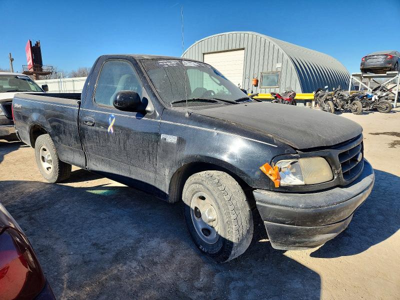 Foto 4 de la subasta – 2003 FORD F150 con VIN 1FTRF17253NA90837