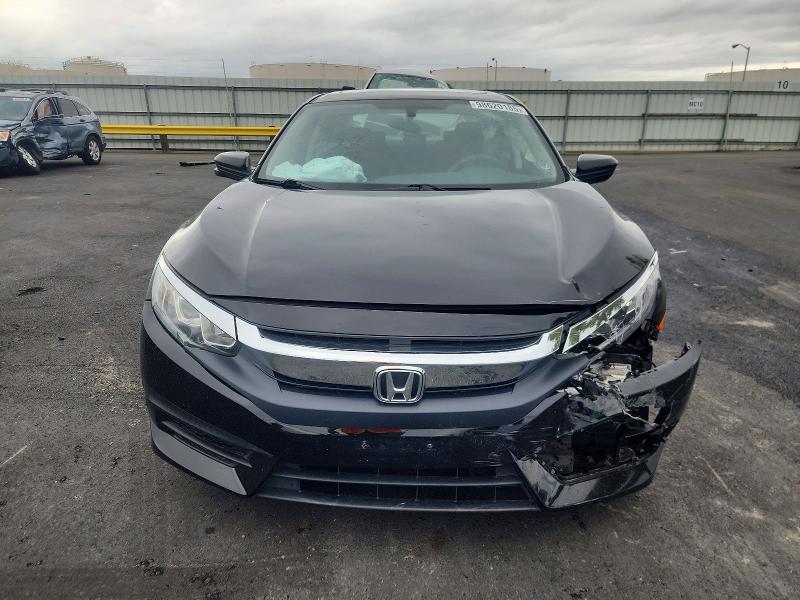 Photo 5 from auction – 2017 HONDA CIVIC EX with VIN 19XFC2F70HE070196