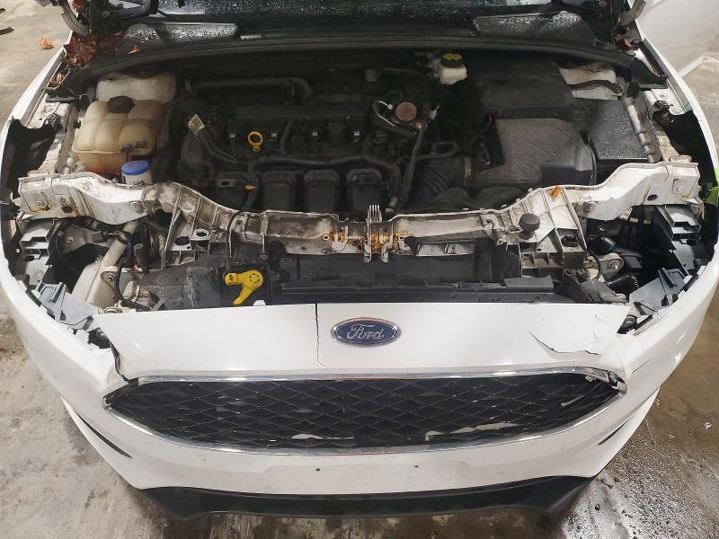 Photo 11 from auction – 2017 FORD FOCUS with VIN 1FADP3F20HL236302