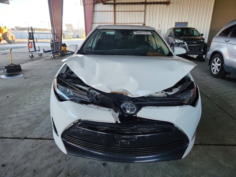 Photo 5 from auction – 2018 TOYOTA COROLLA with VIN 5YFBURHE1JP843116