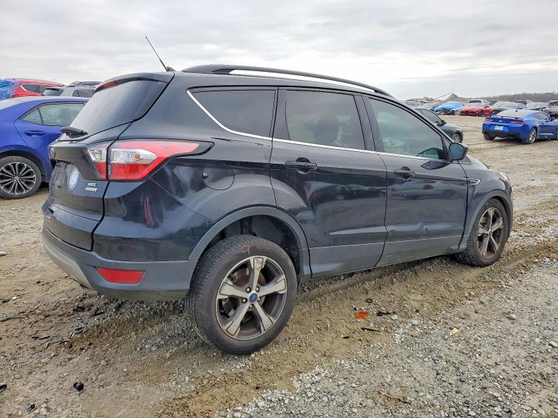 Photo 3 from auction – 2018 FORD ESCAPE SEL with VIN 1FMCU0HD5JUB95592