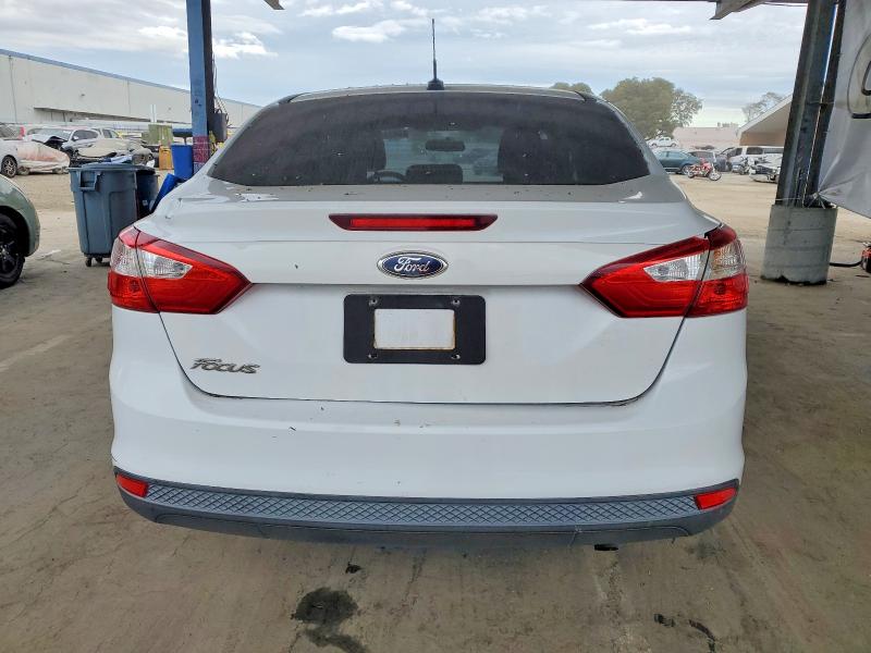 Photo 6 from auction – 2013 FORD FOCUS S with VIN 1FADP3E25DL164413