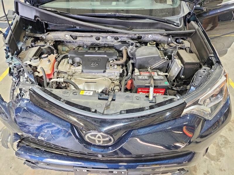 Photo 12 from auction – 2017 TOYOTA RAV4 with VIN JTMJFREV4HJ137721