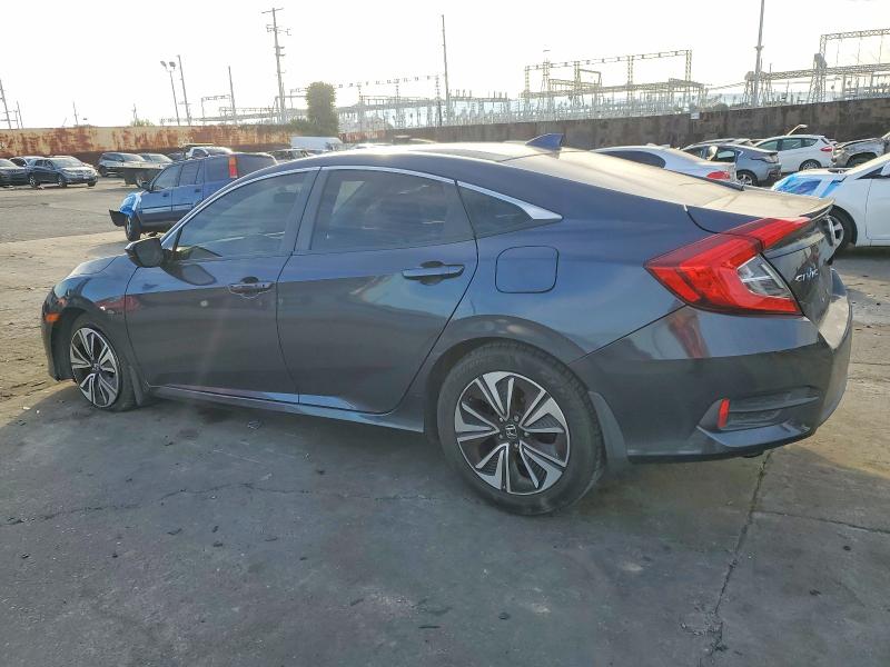 Photo 2 from auction – 2017 HONDA CIVIC with VIN 2HGFC1F34HH640553