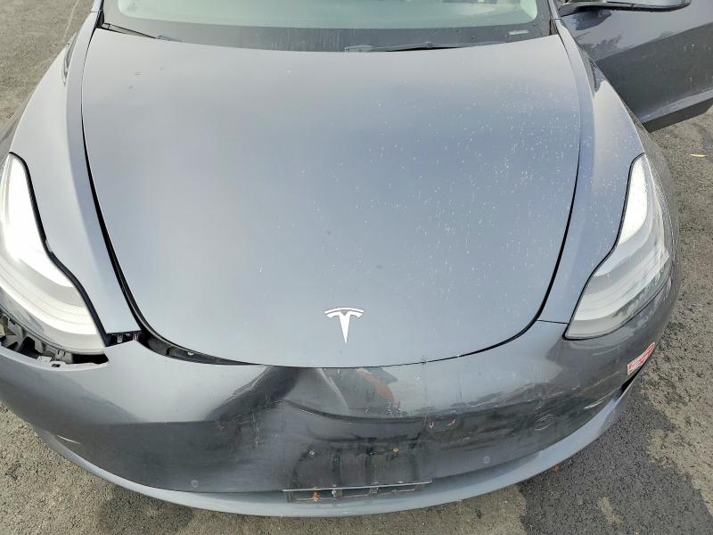 Photo 11 from auction – 2022 TESLA MODEL 3 with VIN 5YJ3E1EB1NF295259