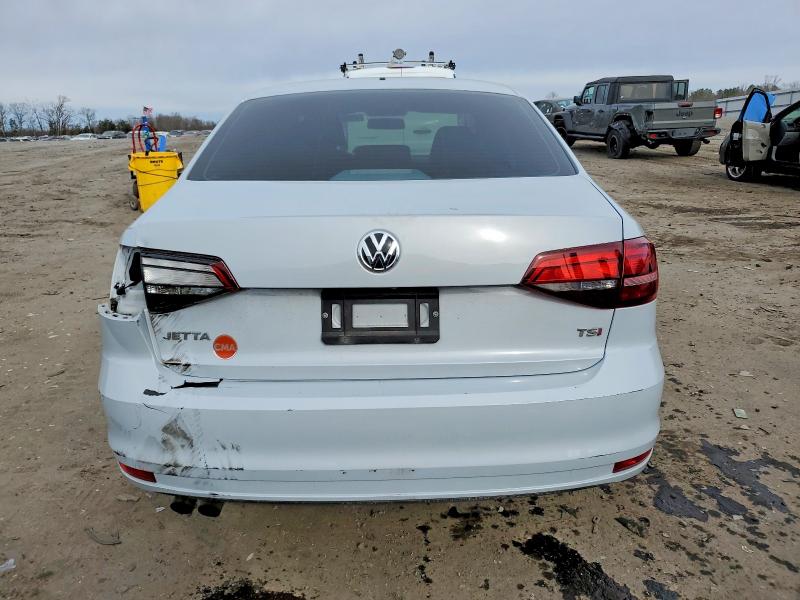 Photo 6 from auction – 2017 VOLKSWAGEN JETTA S with VIN 3VW2B7AJ4HM329311
