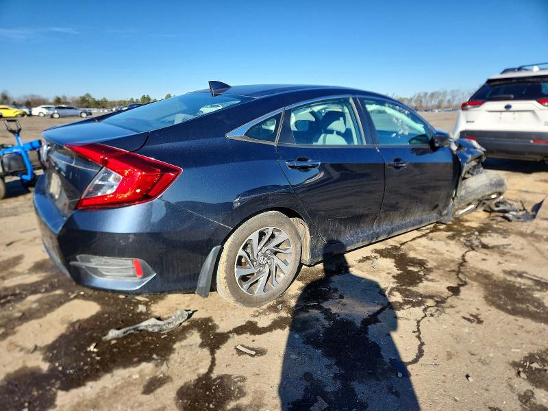 Photo 3 from auction – 2017 HONDA CIVIC EX with VIN 2HGFC2F75HH572093