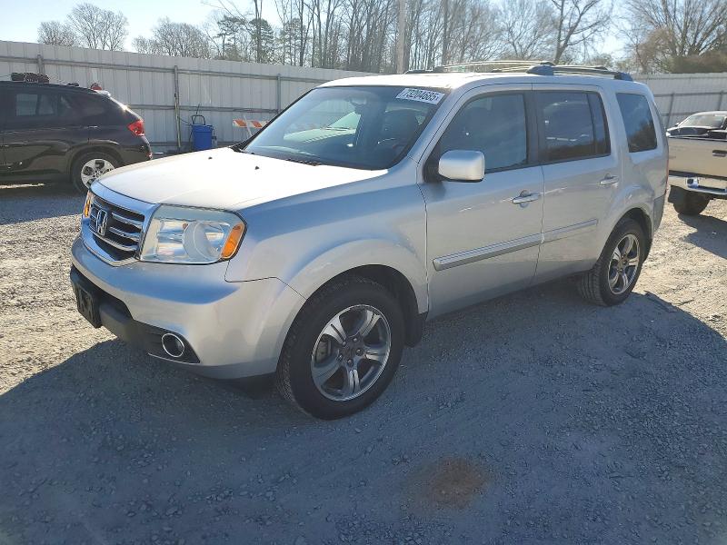 HONDA PILOT SE 2015 с VIN 5FNYF4H34FB069520 - Фото с аукциона