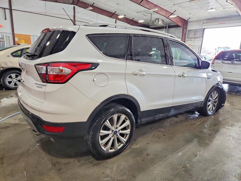 Photo 3 from auction – 2017 FORD ESCAPE TIT with VIN 1FMCU0J99HUA49034
