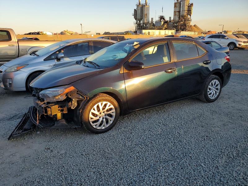 TOYOTA COROLLA L 2019 with VIN 5YFBURHE9KP894672 - Photo from auction
