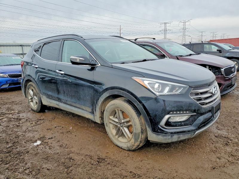 Photo 4 from auction – 2017 HYUNDAI SANTA FE S with VIN 5NMZU3LB4HH034366