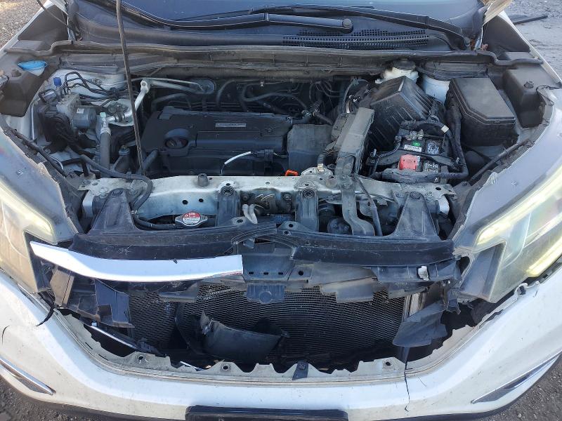 Photo 12 from auction – 2016 HONDA CR-V with VIN 5J6RM4H5XGL048952