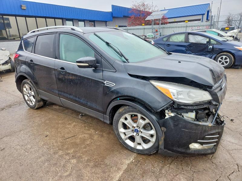 Photo 4 from auction – 2014 FORD ESCAPE with VIN 1FMCU9J95EUB28037