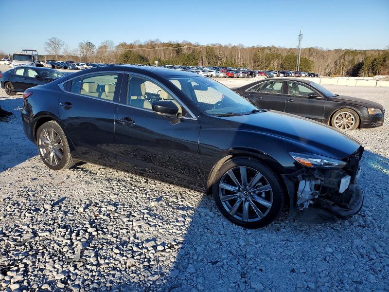 Photo 4 from auction – 2021 MAZDA 6 with VIN JM1GL1VM0M1604543