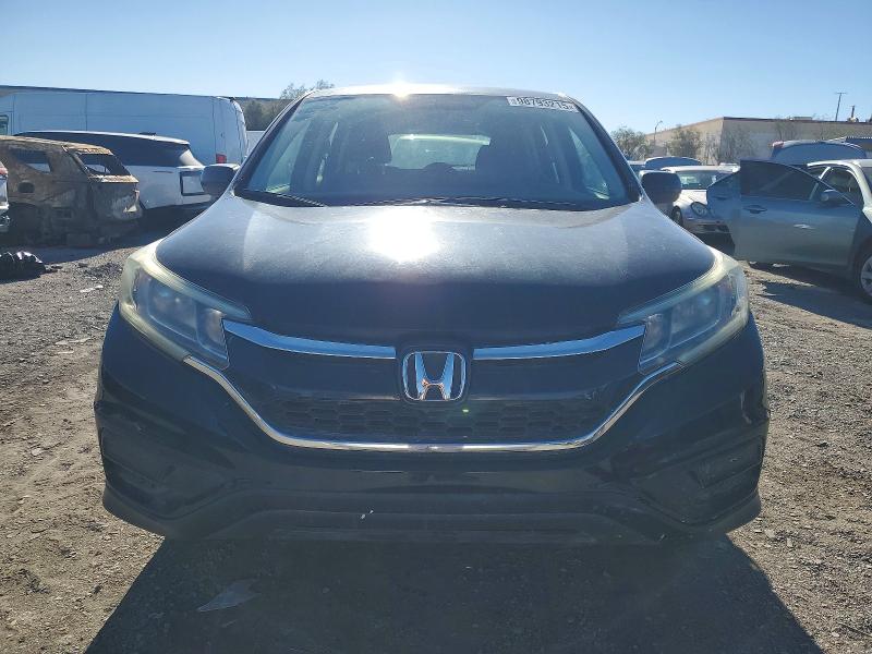 Photo 5 from auction – 2016 HONDA CR-V LX with VIN 3CZRM3H34GG705346