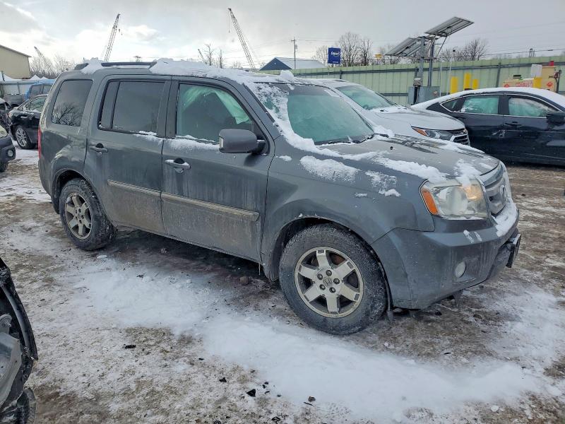 Photo 4 from auction – 2011 HONDA PILOT TOUR with VIN 5FNYF4H9XBB067379