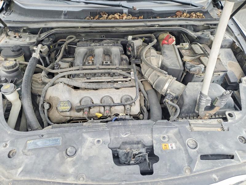 Photo 11 from auction – 2011 FORD TAURUS SE with VIN 1FAHP2DW4BG149388