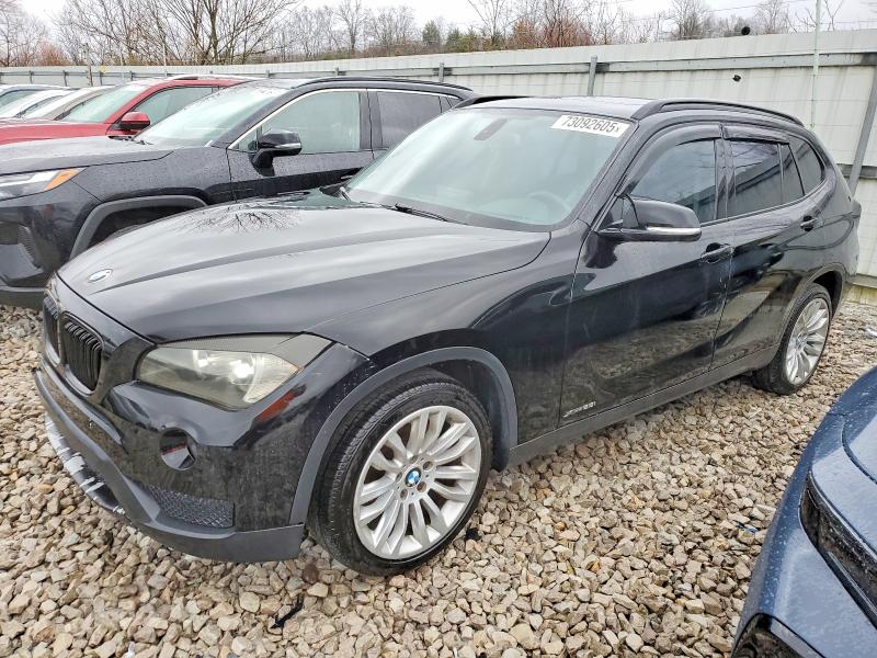 BMW X1 XDRIVE2 2014 with VIN WBAVL1C56EVY17281 - Photo from auction