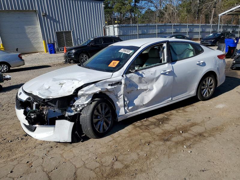 KIA OPTIMA 2018 with VIN 5XXGU4L31JG264912 - Photo from auction