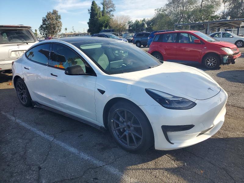 Photo 4 from auction – 2021 TESLA MODEL 3 with VIN 5YJ3E1EA4MF930724