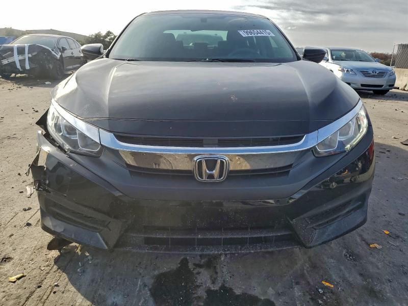 Photo 5 from auction – 2017 HONDA CIVIC EX with VIN 19XFC2F74HE063641