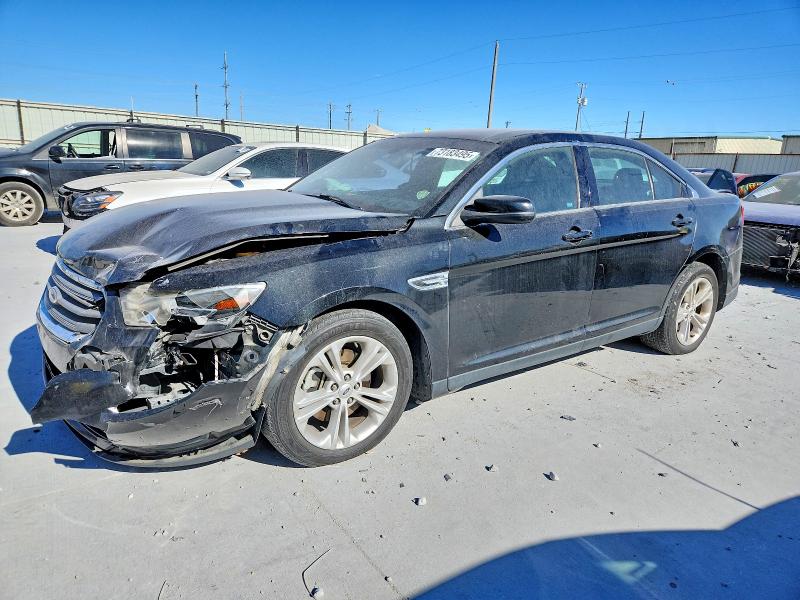 FORD TAURUS SEL 2014 with VIN 1FAHP2E81EG170641 - Photo from auction