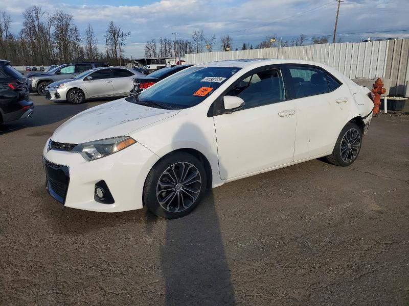 TOYOTA COROLLA L 2014 con VIN 5YFBURHE6EP075509 - Foto de la subasta