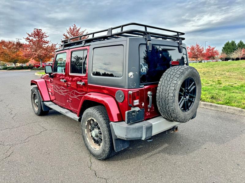 Photo 3 from auction – 2011 JEEP WRANGLER U with VIN 1J4BA5H17BL593450