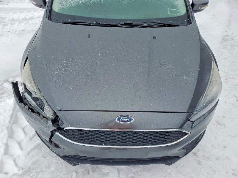 Photo 11 from auction – 2018 FORD FOCUS SEL with VIN 1FADP3M24JL219463