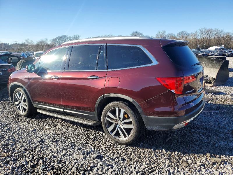 Photo 2 from auction – 2016 HONDA PILOT TOUR with VIN 5FNYF5H98GB016380