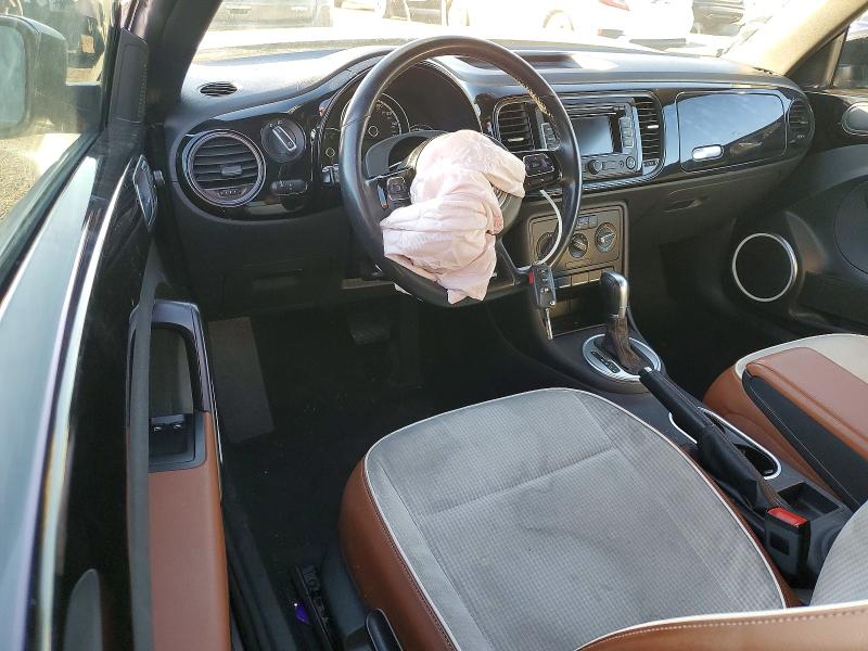 Photo 8 from auction – 2015 VOLKSWAGEN BEETLE with VIN 3VWF17AT4FM652471
