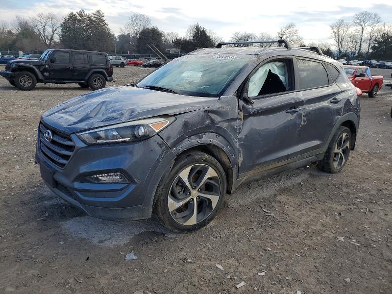 HYUNDAI TUCSON 2016 مع رقم تعريف المركبة KM8J33A21GU106310 - صورة من المزاد