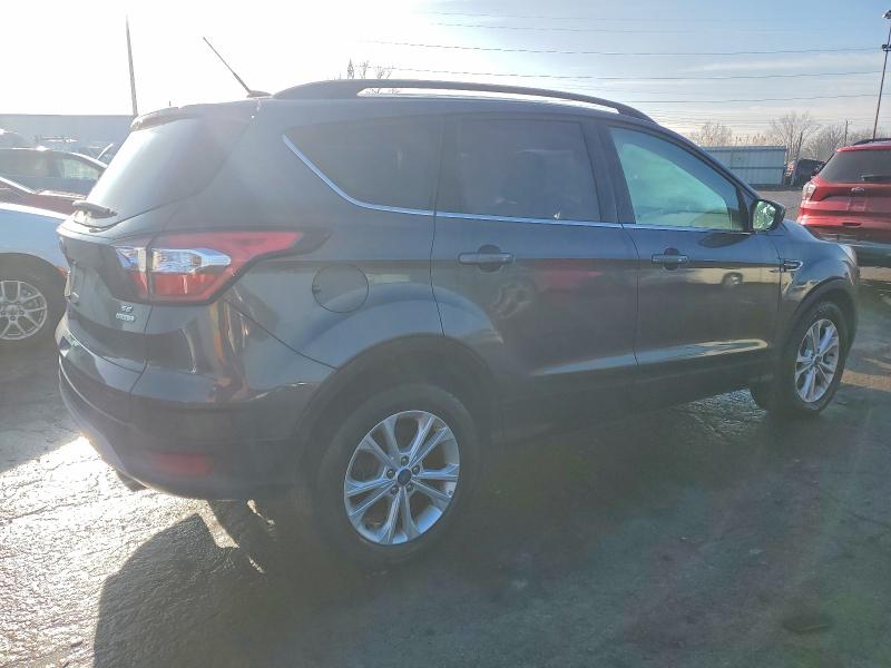 Photo 3 from auction – 2018 FORD ESCAPE SE with VIN 1FMCU0GD6JUB61758