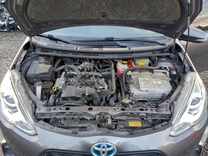 Photo 11 from auction – 2015 TOYOTA PRIUS C with VIN JTDKDTB35F1086656