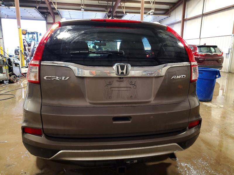 Photo 6 from auction – 2015 HONDA CR-V EXL with VIN 5J6RM4H72FL061033