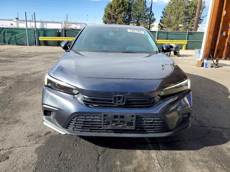 Photo 5 from auction – 2023 HONDA CIVIC TOUR with VIN 2HGFE1F96PH313343