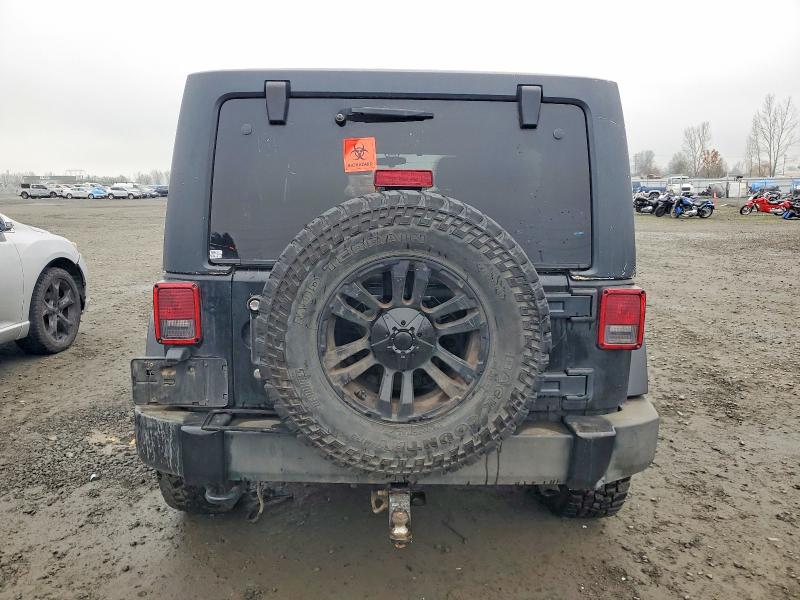 Photo 6 from auction – 2011 JEEP WRANGLER U with VIN 1J4BA3H14BL511646