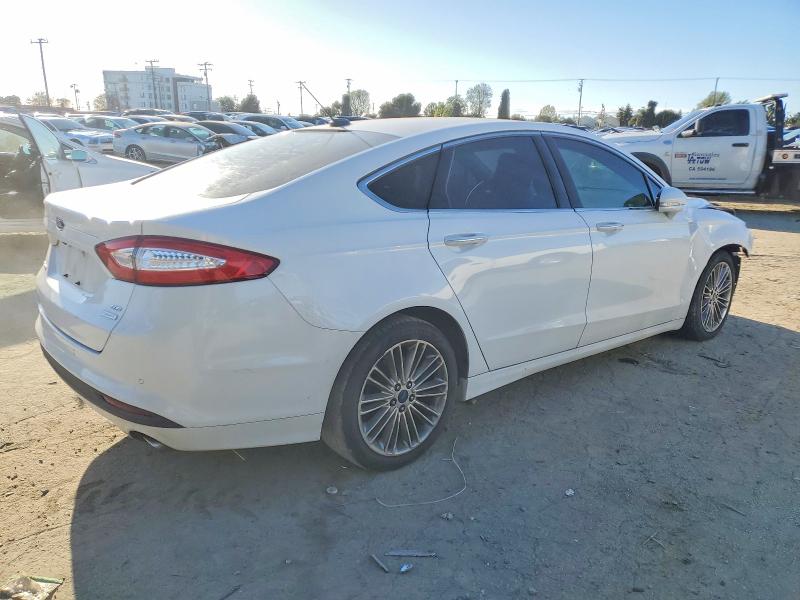 Photo 3 from auction – 2016 FORD FUSION with VIN 3FA6P0HD9GR115273