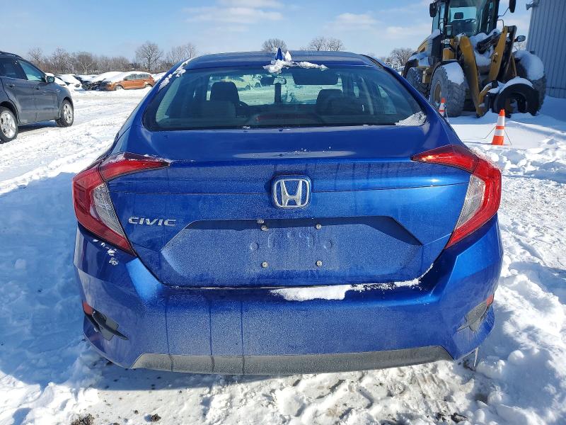 Photo 6 from auction – 2018 HONDA CIVIC EX with VIN 19XFC2F73JE044018