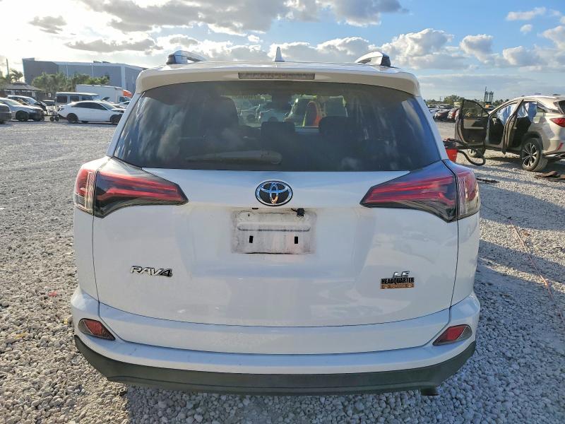 Photo 6 from auction – 2018 TOYOTA RAV4 with VIN 2T3ZFREV7JW475821