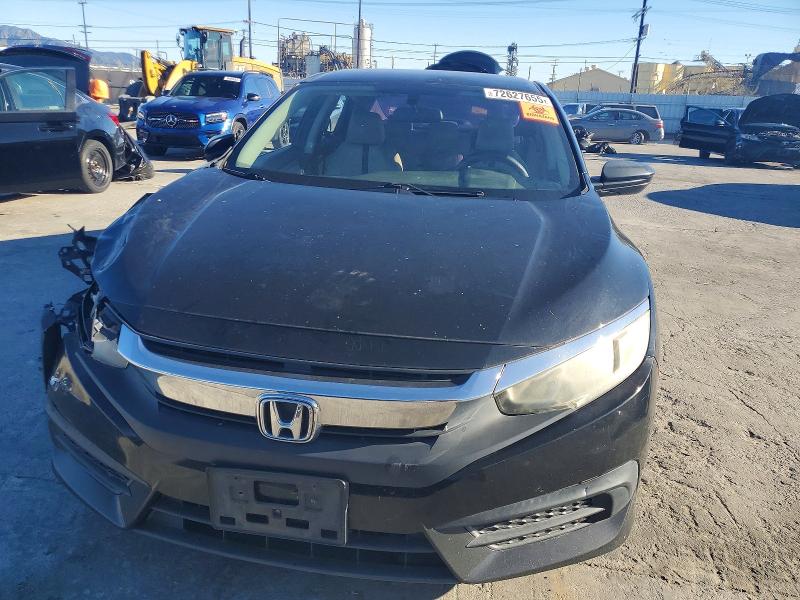Photo 5 from auction – 2016 HONDA CIVIC LX with VIN 2HGFC2F52GH512236