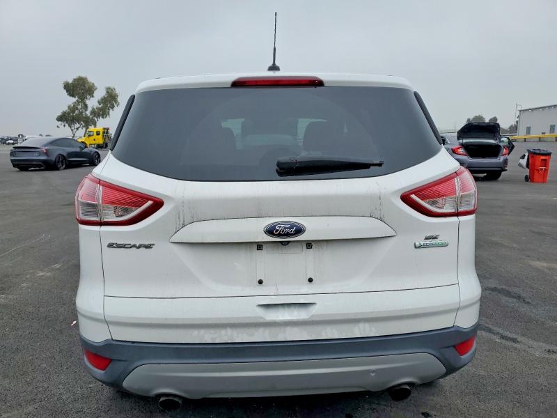 Photo 6 from auction – 2016 FORD ESCAPE with VIN 1FMCU0GX4GUB39180