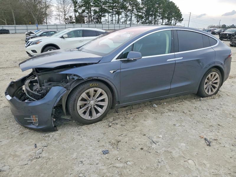 TESLA MODEL X 2017 with VIN 5YJXCBE21HF035574 - Photo from auction