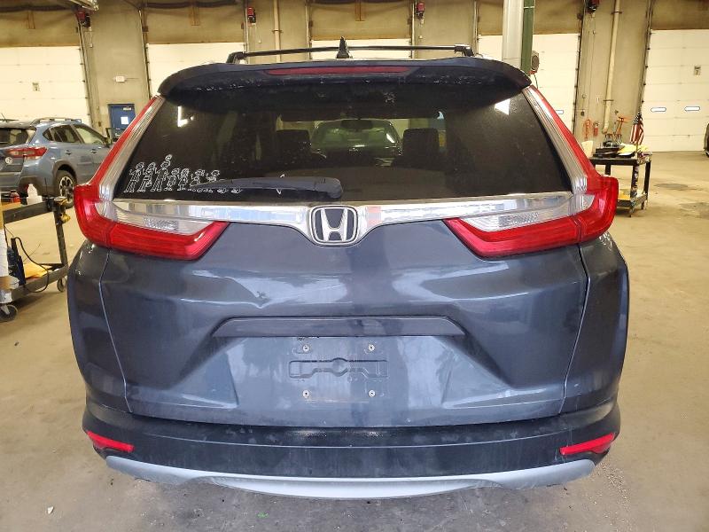 Photo 6 from auction – 2018 HONDA CR-V EX with VIN 7FARW2H54JE059299