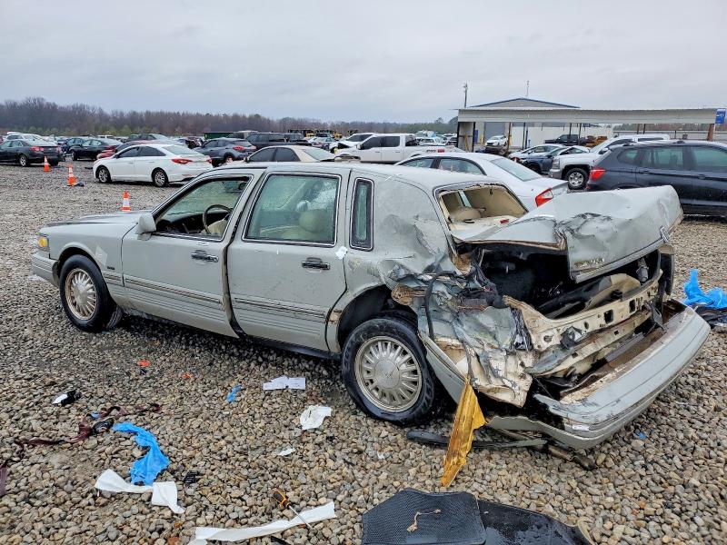 Photo 2 from auction – 2000 LINCOLN TOWN CAR E with VIN 1L1FM81W9YY804792