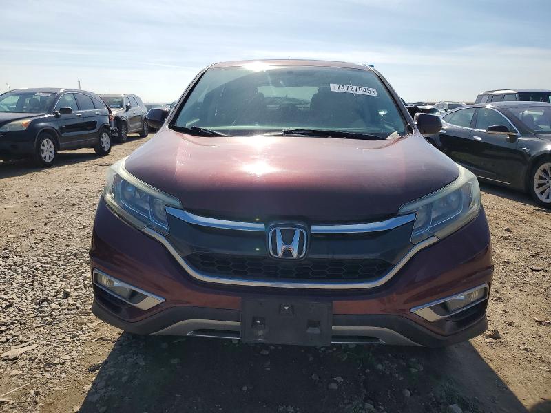 Photo 5 from auction – 2015 HONDA CR-V with VIN 2HKRM3H50FH554745