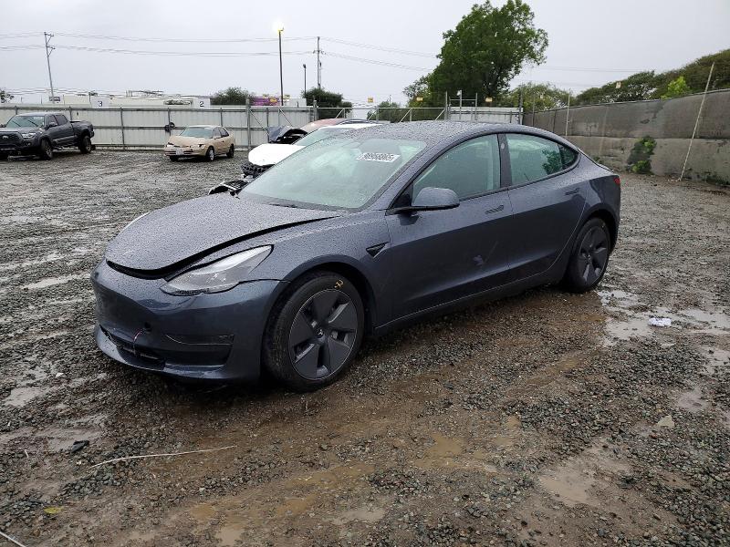 TESLA MODEL 3 2023 with VIN 5YJ3E1EA9PF709933 - Photo from auction